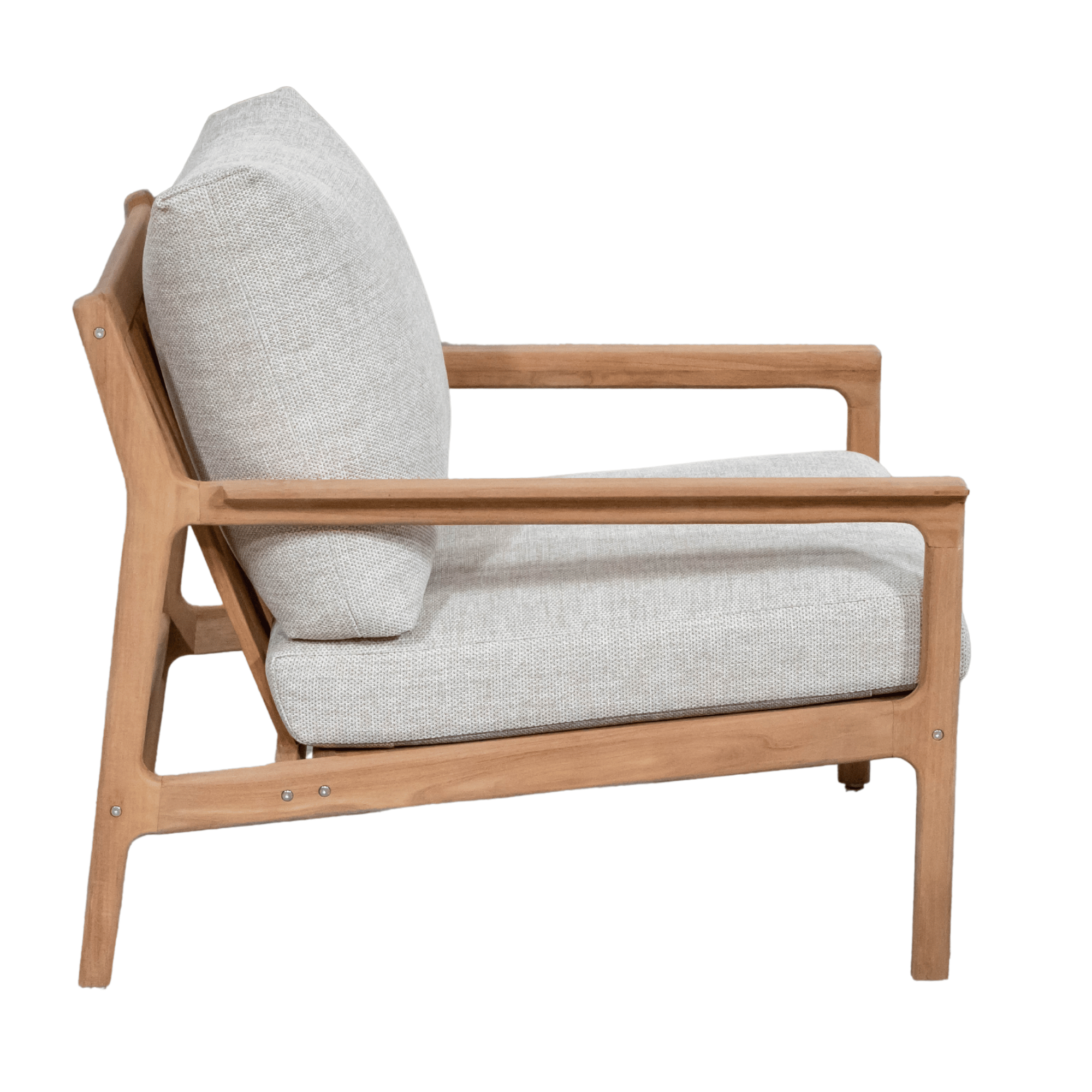A mid-century modern outdoor armchair with a light teak wood frame and beige textured fabric cushions, shown from a side profile view on a white background.