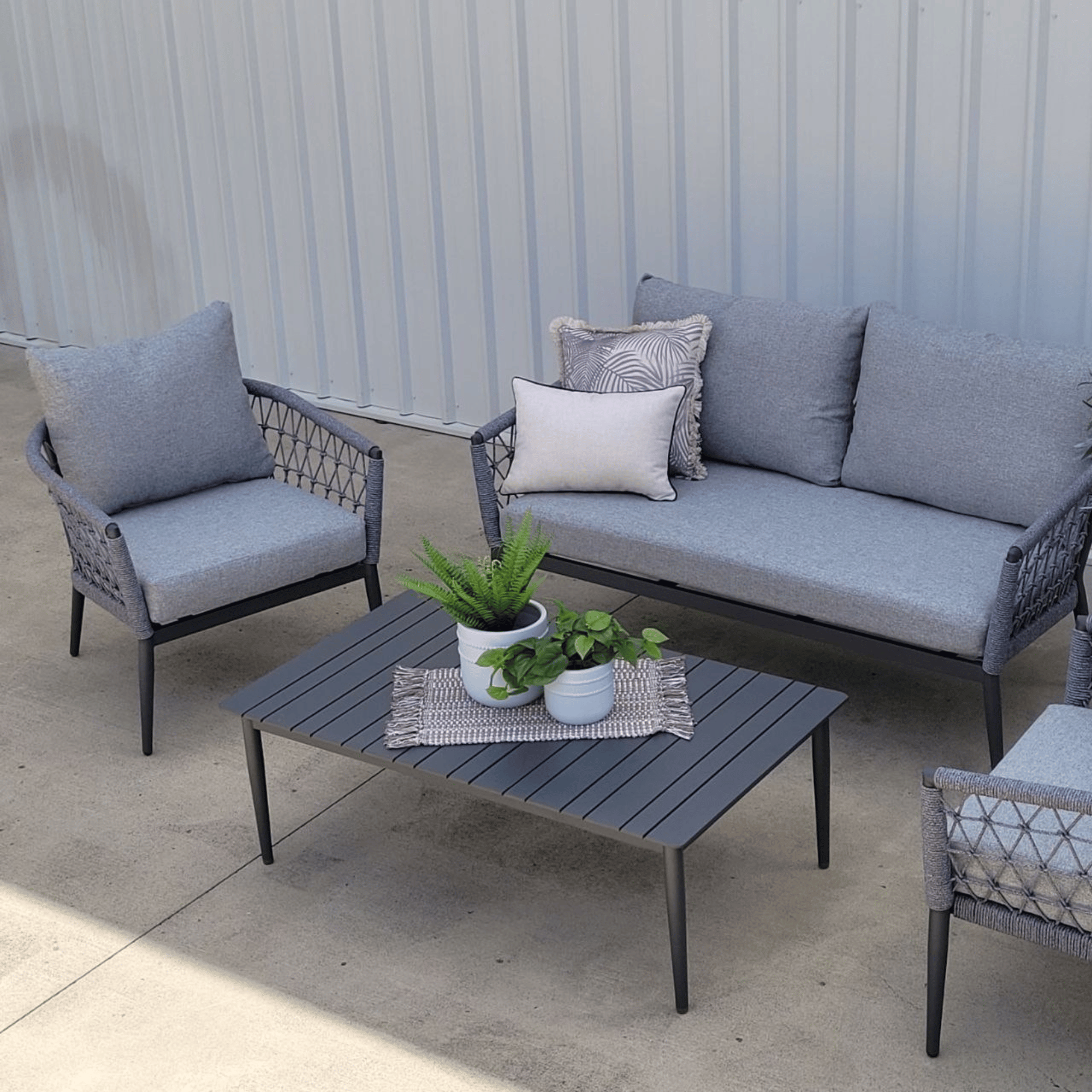 Kinsley 4-Piece Outdoor Lounge Setting with Two-Seater Sofa