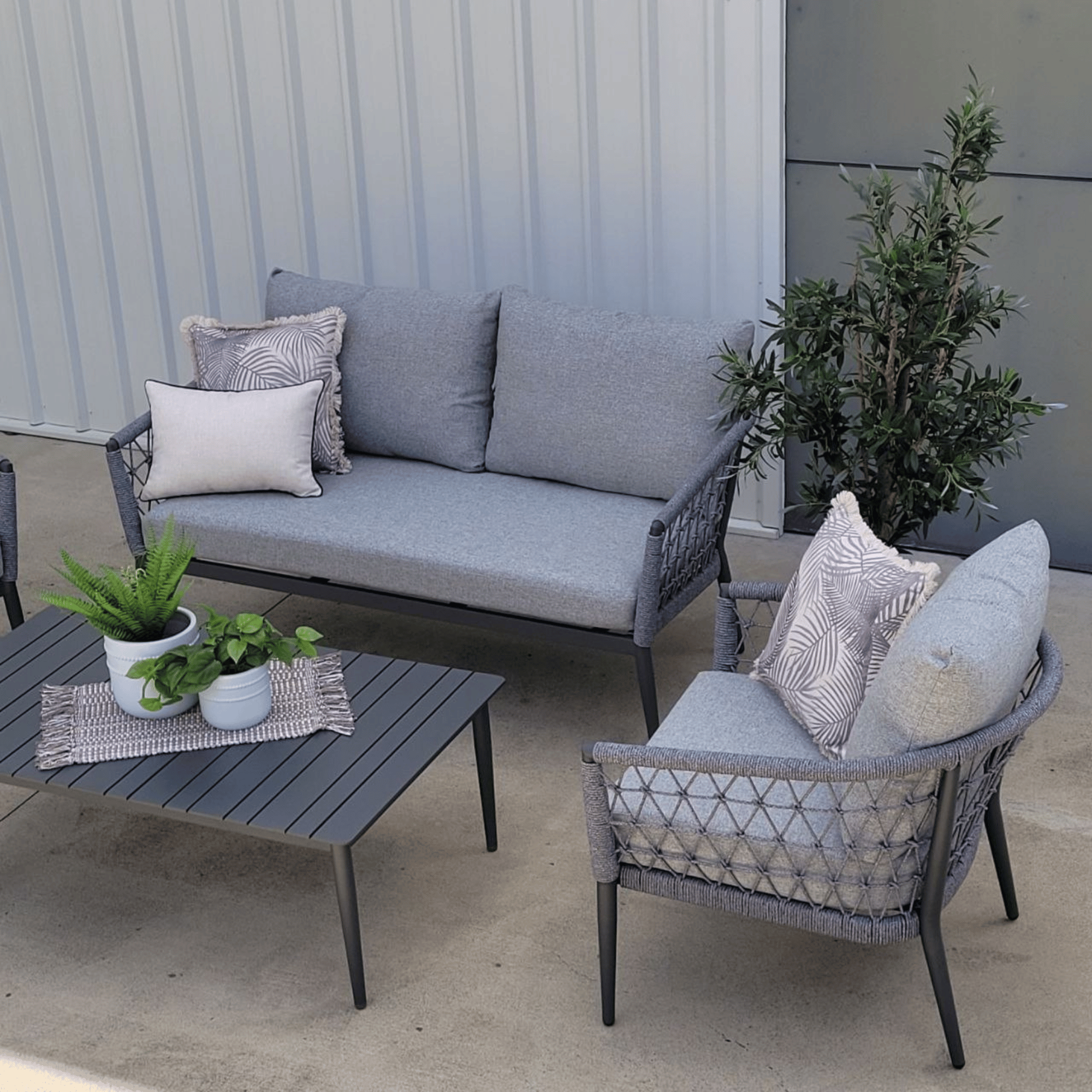 Kinsley 4-Piece Outdoor Lounge Setting with Two-Seater Sofa