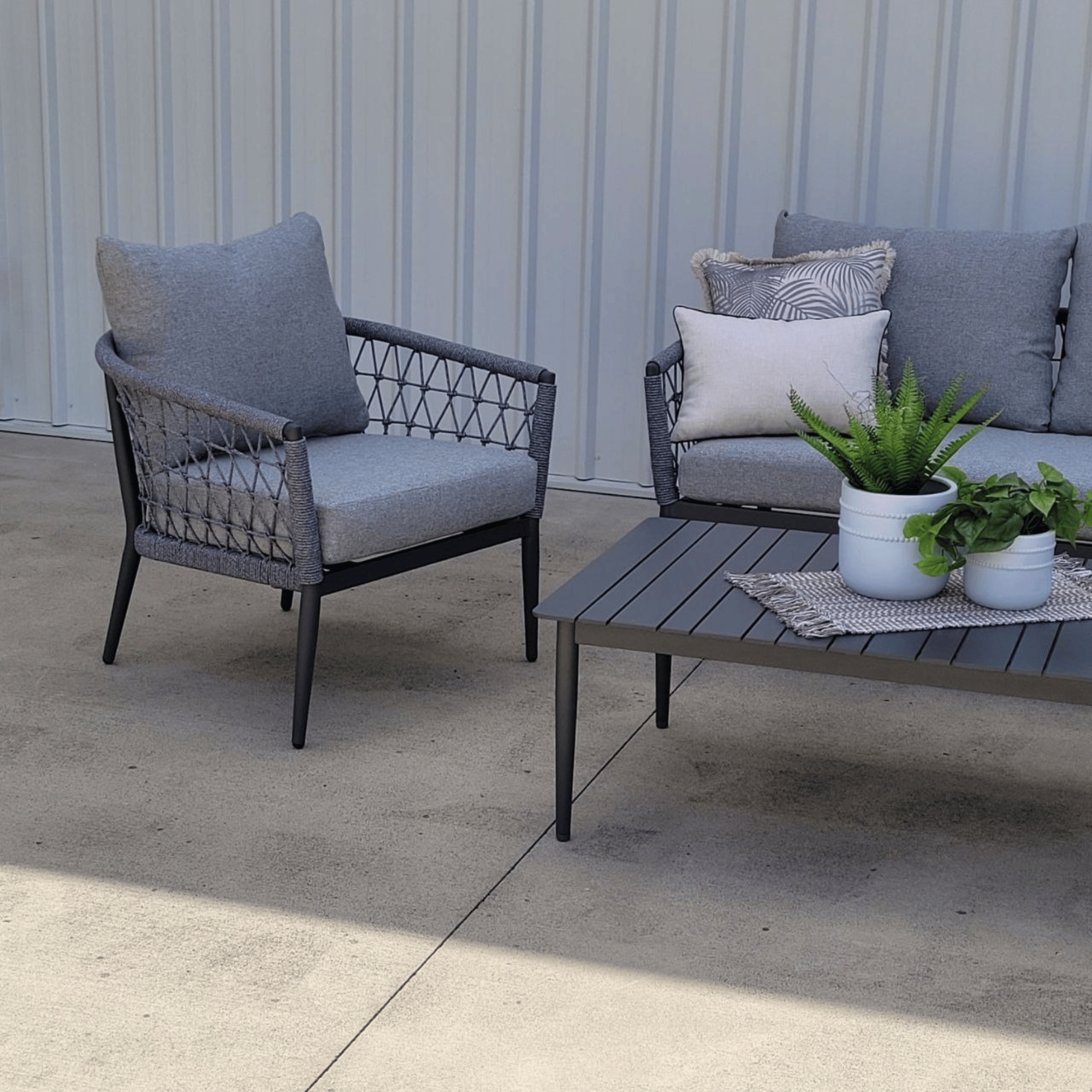 Kinsley 4-Piece Outdoor Lounge Setting with Two-Seater Sofa