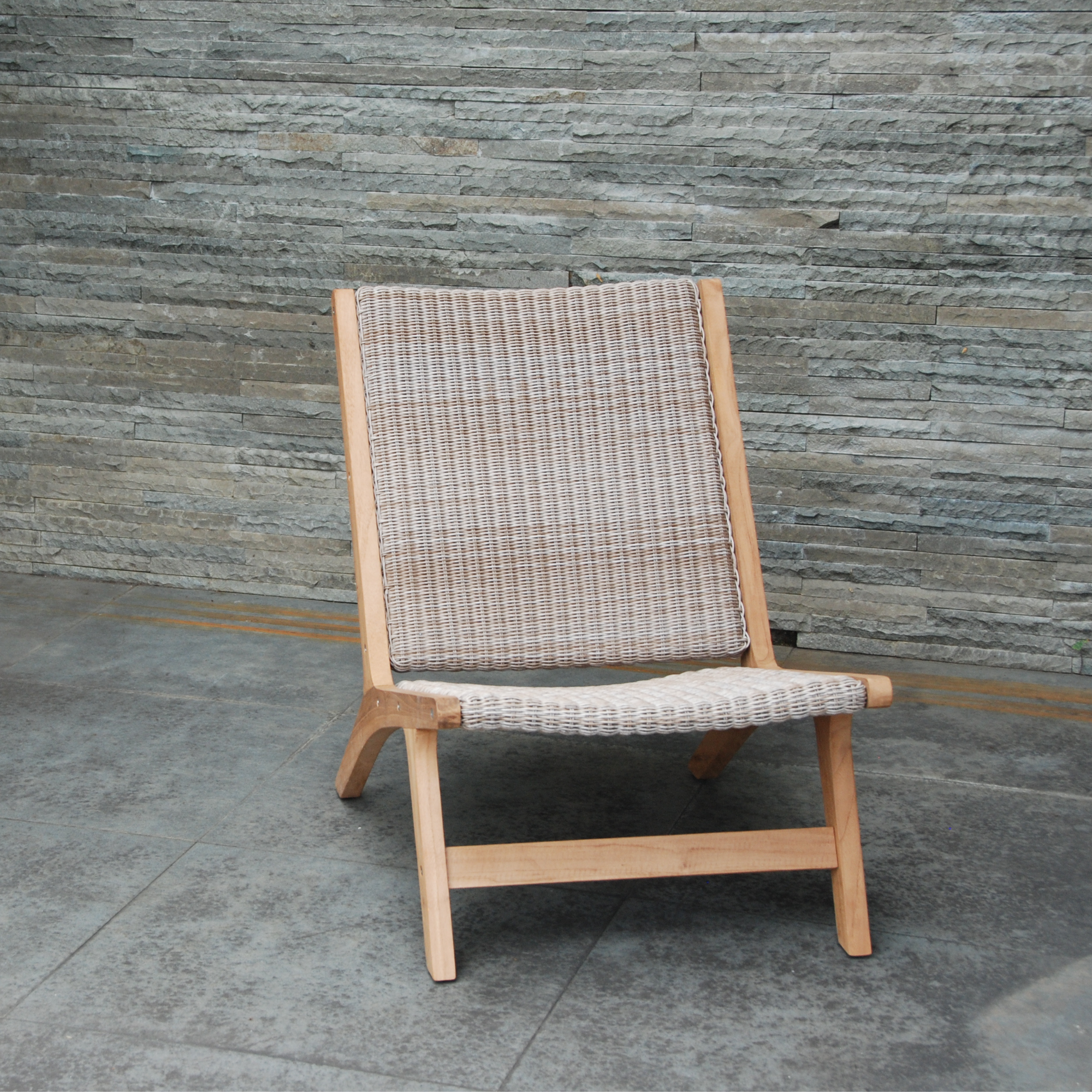 Salem teak and 'irish coffee' wicker outdoor lounge chair