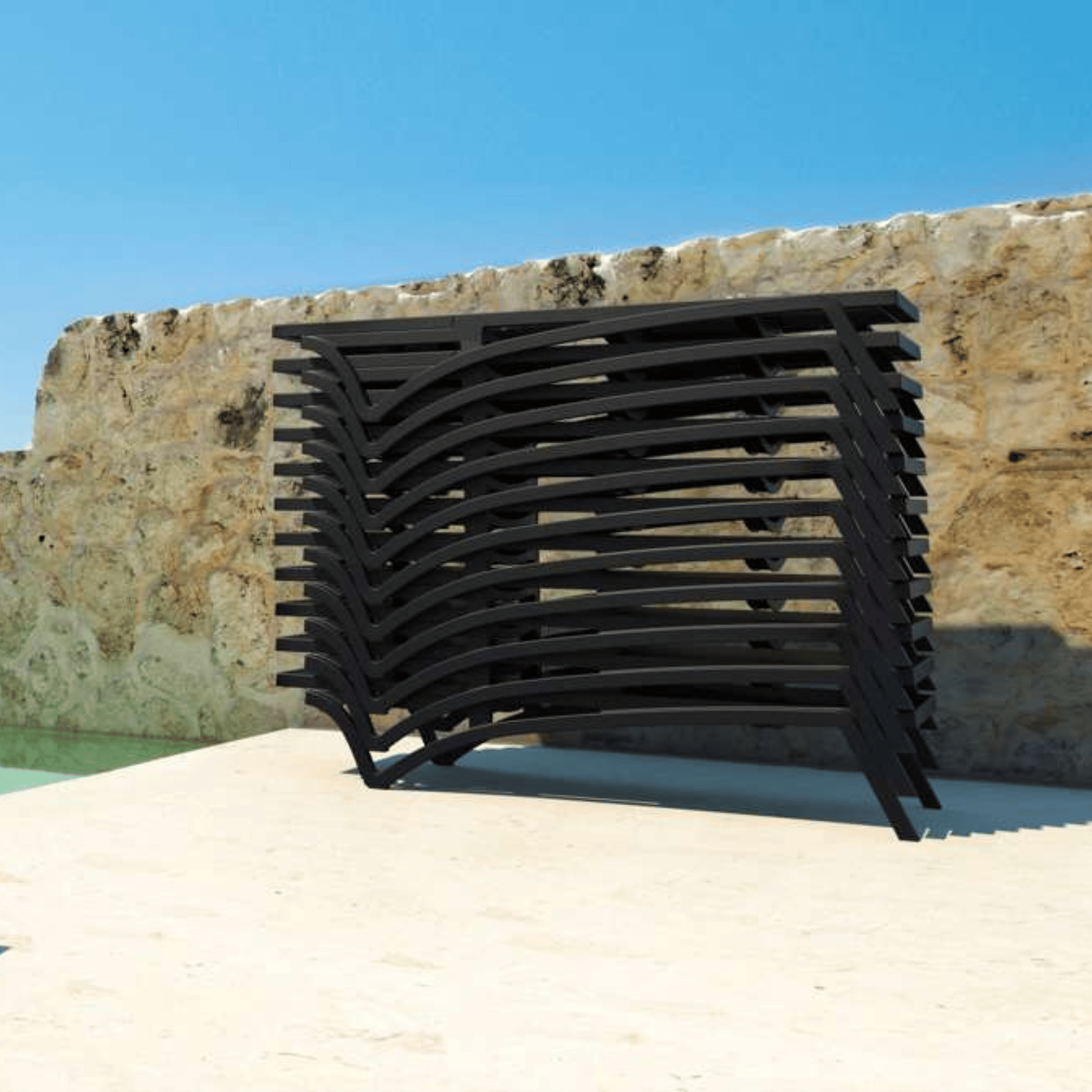 A stack of Siesta Pacific Sunlounge - Black - Commercial Grade
