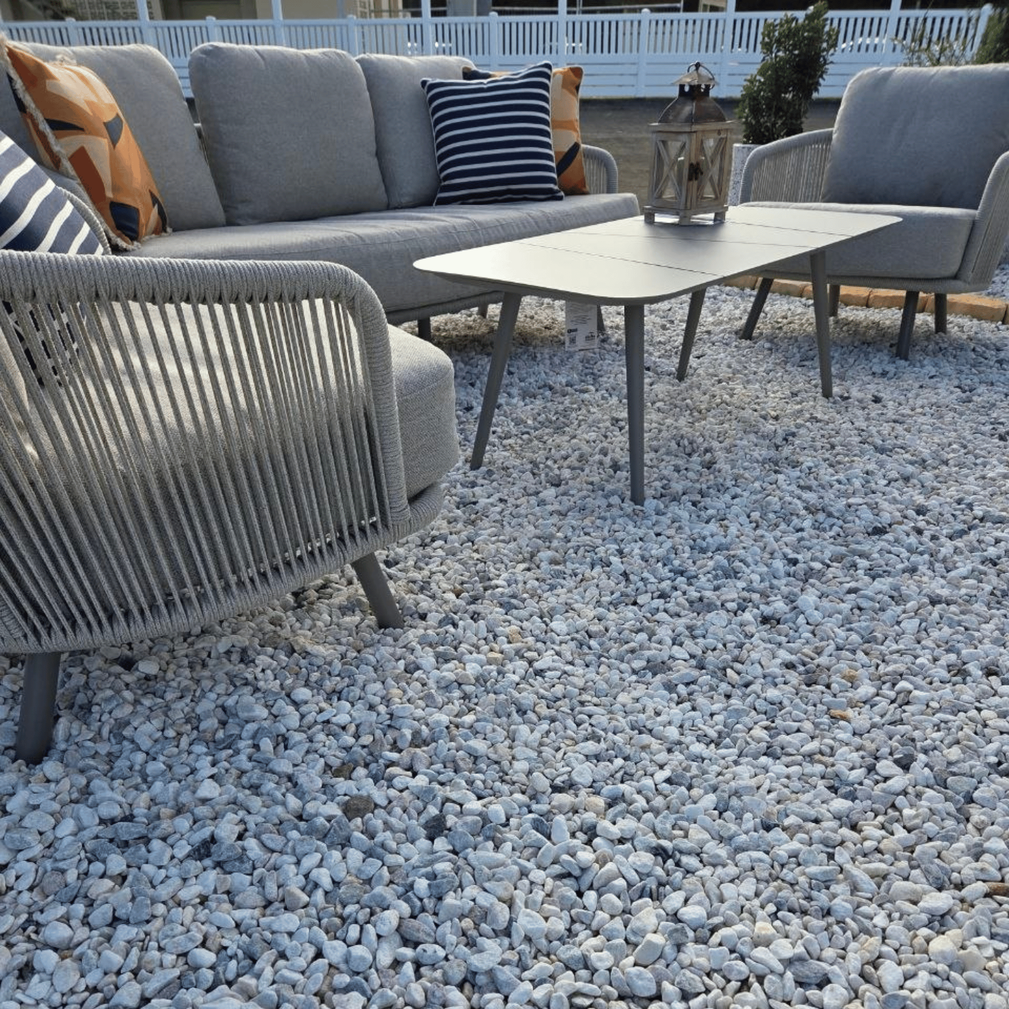 Valencia 4pce Lounge Setting on a gravel outdoor area