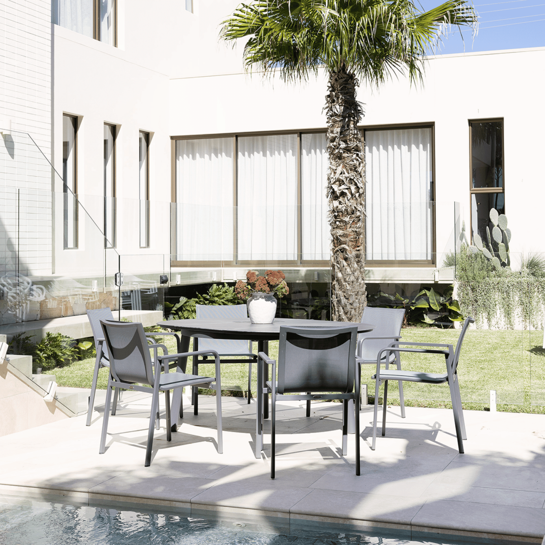 Cozy Extendable Table with Chic Chairs - 7 piece Outdoor Dining Setting - Lume Outdoor Living