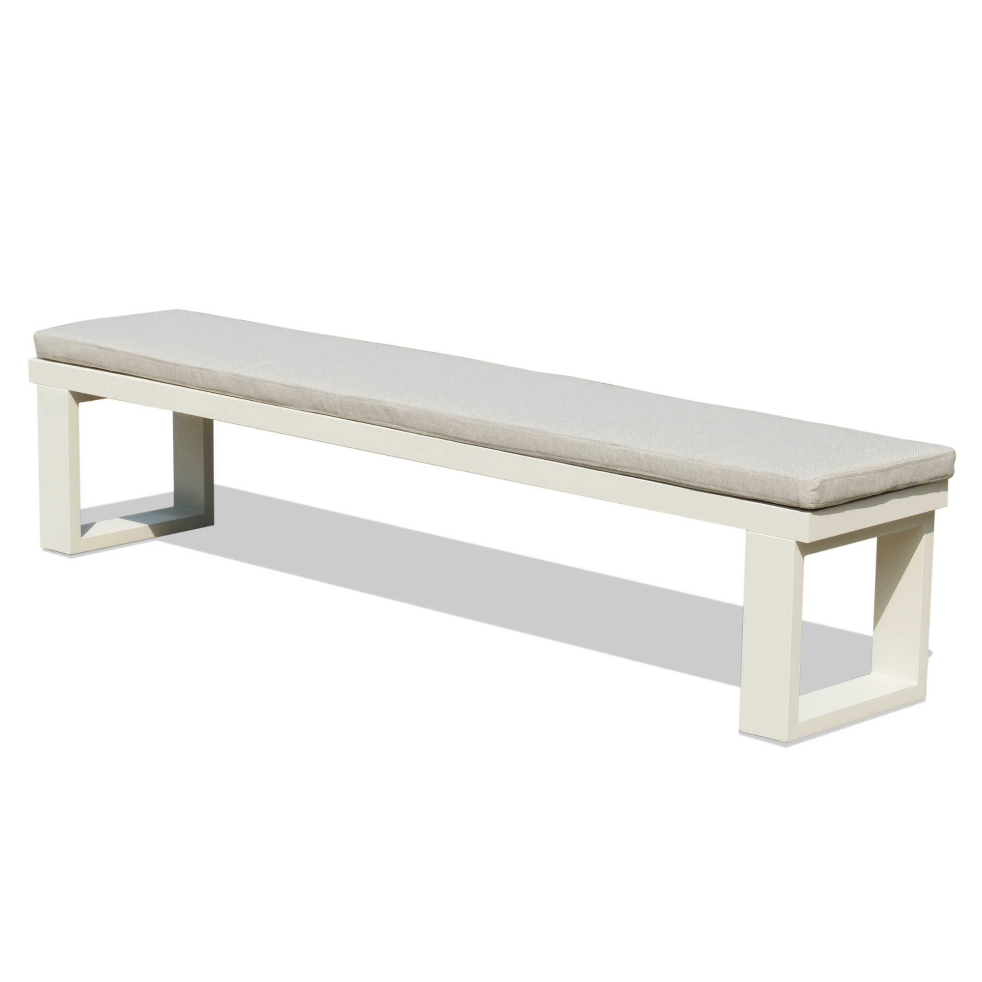Long white bench with a gray cushion on a white background