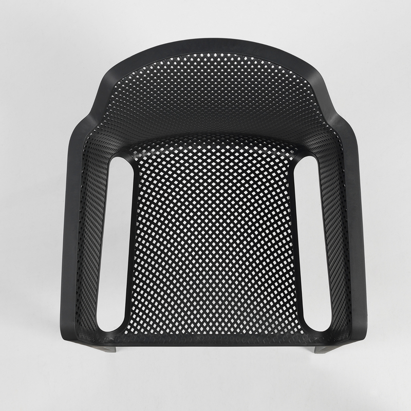 Net by Nardi means refined relaxation in an outdoor chair: a single-body chair in fiberglass resin, decorated with a radial pattern of square perforations across the whole surface of the seat.