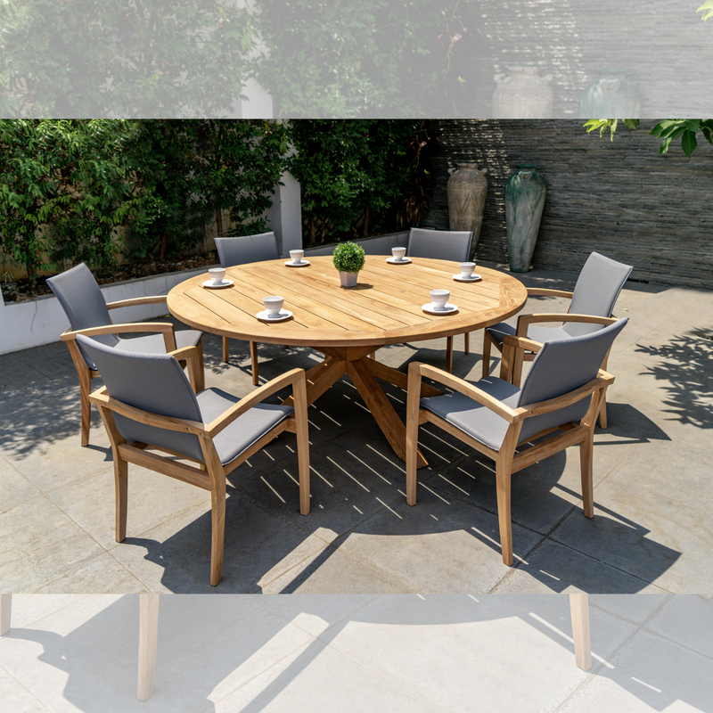 round teak dining table and 6 chairs
