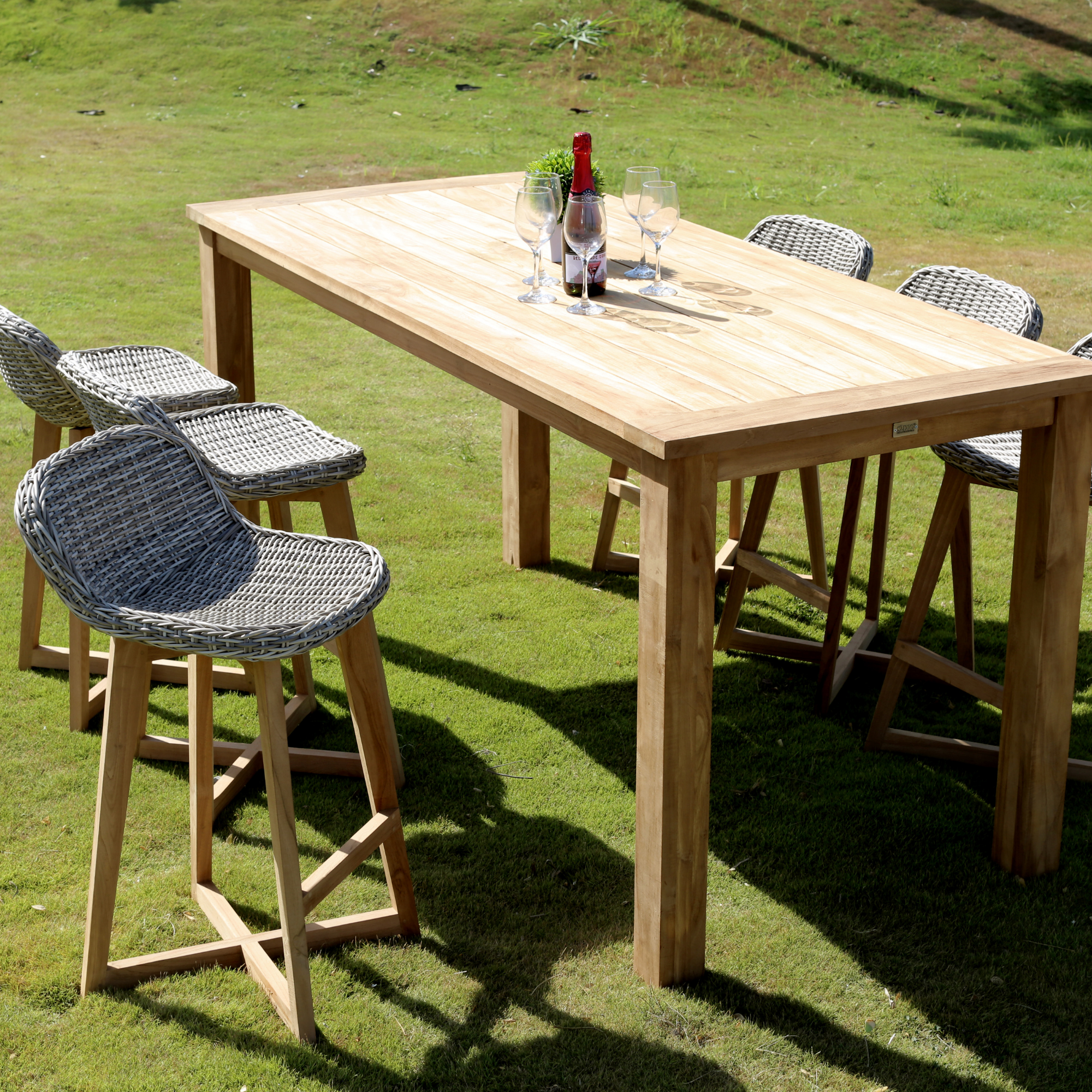 teak and wicker bar setting